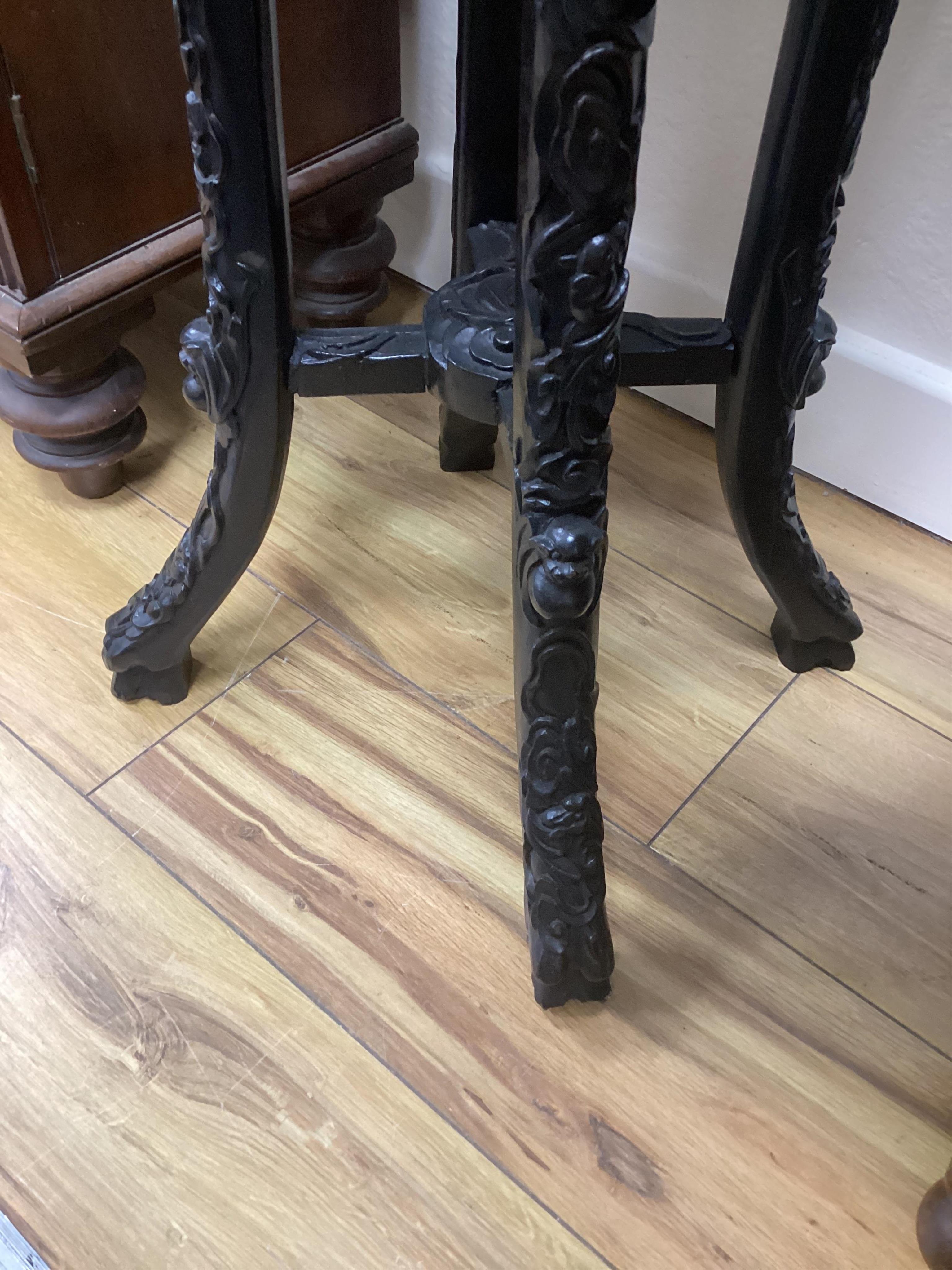 A Chinese octagonal marble topped vase stand, width 32cm, height 91cm